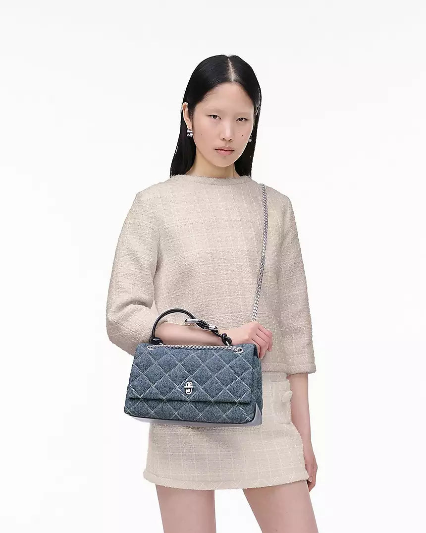 THE QUILTED
DENIM DUAL CONVERTIBLE SHOULDER BAG MEDIUM